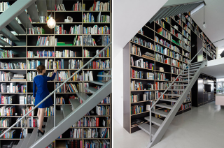 Illustration for article titled This Dream House Was Entirely Built Around a Giant Three-Story-High Bookshelf